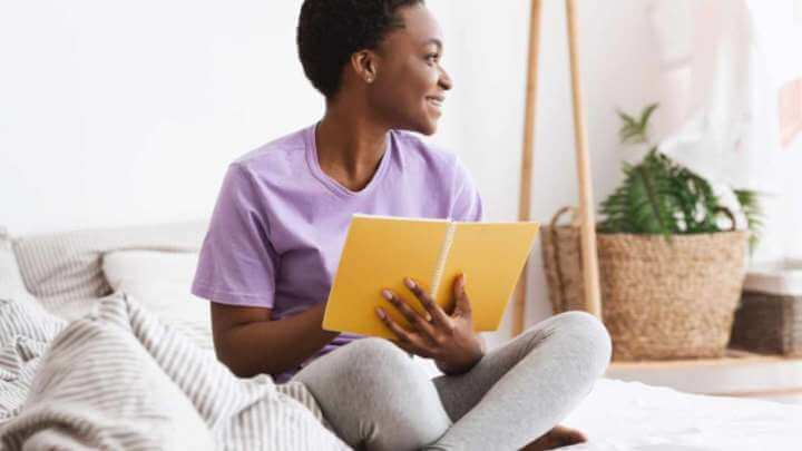 young lady keeps a sleep diary